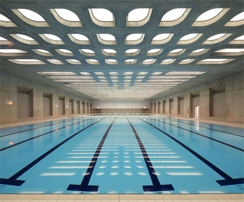 בריכת השחייה המרהיבה של זאהה חדיד הוקטנה אחרי המשחקים ומשרתת את הציבור (באדיבות Zaha Hadid Architects)