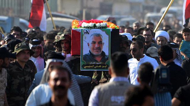 The funeral for the PMF commander killed in an Israeli alleged airstrike in Iraq (Photo: EPA)