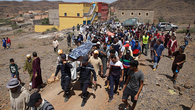 מרוקו הרוגים הצפות מגרש כדורגל שיטפון  (צילום: AFP)