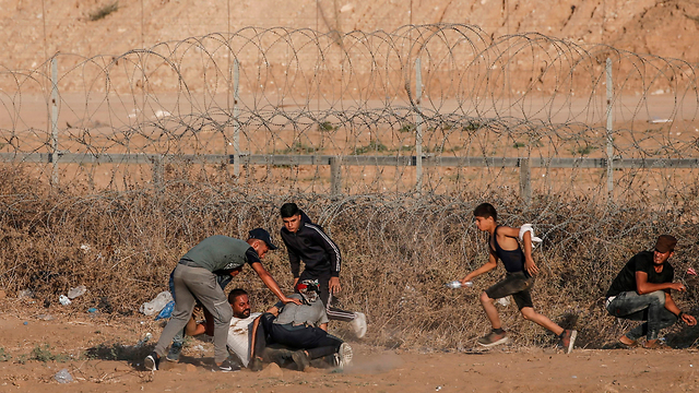 מהומות יום שישי בגבול הרצועה (צילום: AFP)