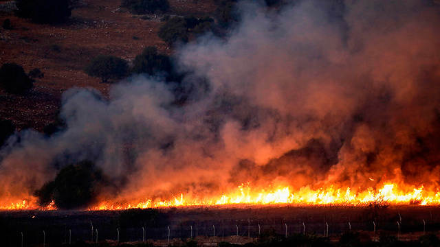 שריפה ליד אביבים גבול לבנון חילופי ירי עם חיזבאללה (צילום: AFP)