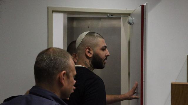 מתן לוגסי בית משפט תל אביב  הורשע במעשה סדום עבריין מין   (צילום: מוטי קמחי)