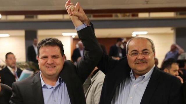 Leading Arab MKs Ayman Odeh, left, and Ahmad Tibi announce the reformation of the Joint List ahead of the September elections