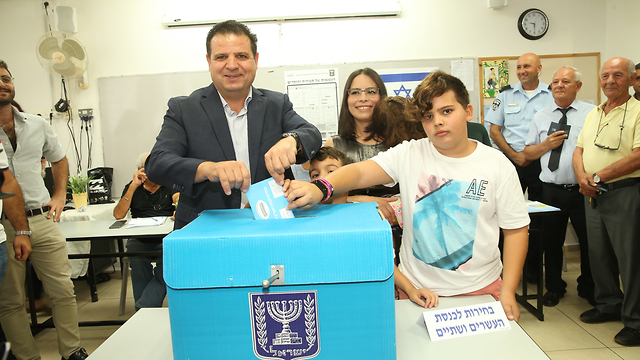 Joint List leader Ayman Odeh votes in Haifa on Election Day (Photo: Elad Gershgoren)
