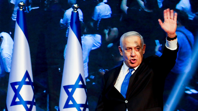 Benjamin Netanyahu greets supporters in Tel Aviv on election night (Photo: Reuters)