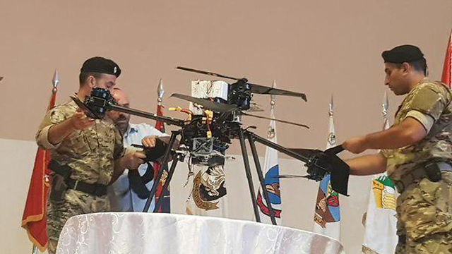 Lebanese officers showcasing a drone
