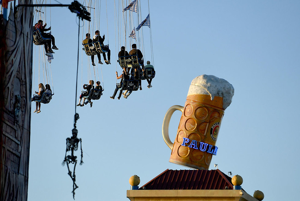 פסטיבל בירה אוקטוברפסט מינכן גרמניה (צילום: רויטרס)