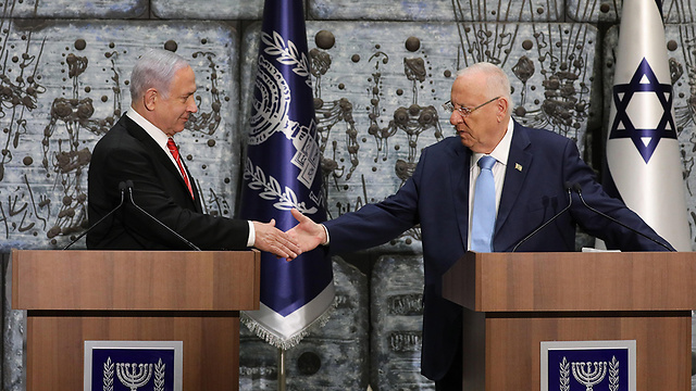 President Reuven Rivlin tasks Prime Minister Benjamin Netanyahu with forming the next Israeli government in Jerusalem, Sept. 25, 2019 (Photo: EPA)