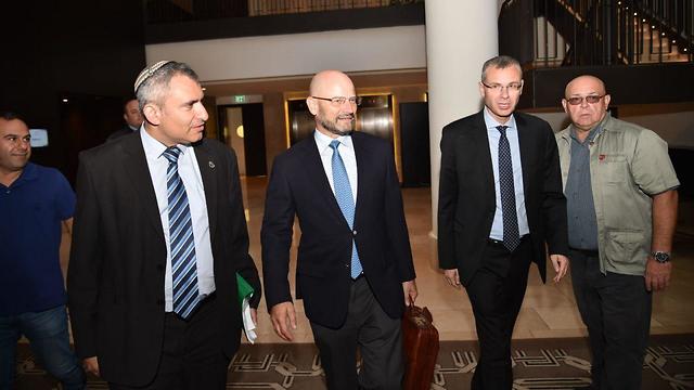 Likud and Bue and White negotiators meeting Friday in Jerusalem (Photo: Yoav Dudkevitch )