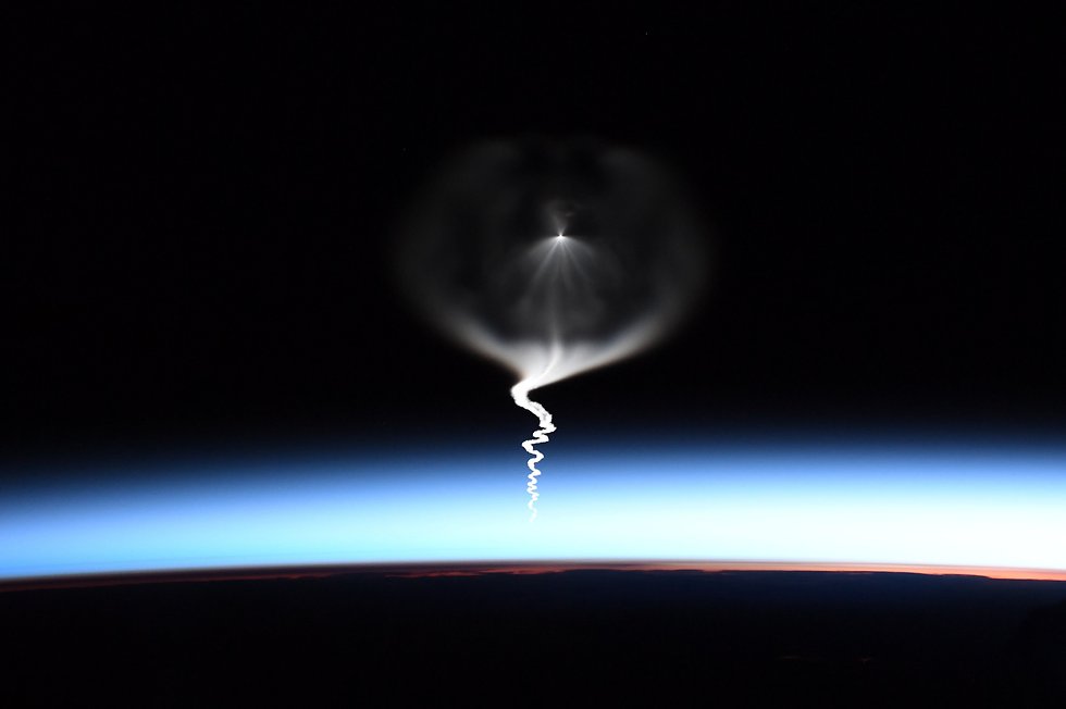 כך נראה שיגור החללית סויוז מהחלל (צילום: כריסטינה קוק, נאס