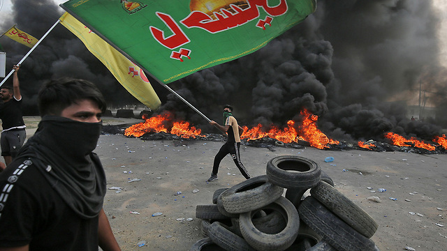 מחאה ב בגדד עיראק (צילום: AFP)