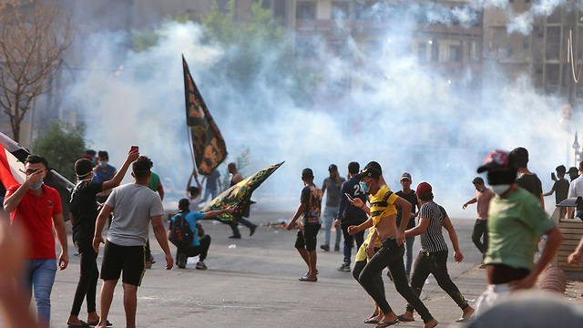 מחאה ב בגדד עיראק (צילום: AFP)