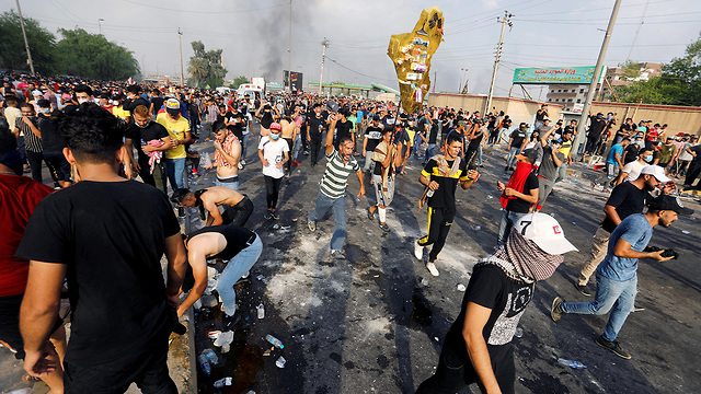 מחאה ב בגדד עיראק (צילום: רויטרס)