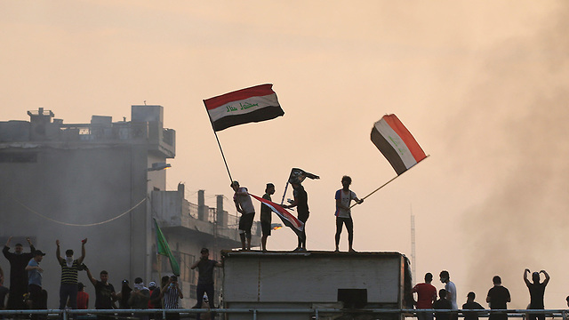 מחאה ב בגדד עיראק (צילום: רויטרס)