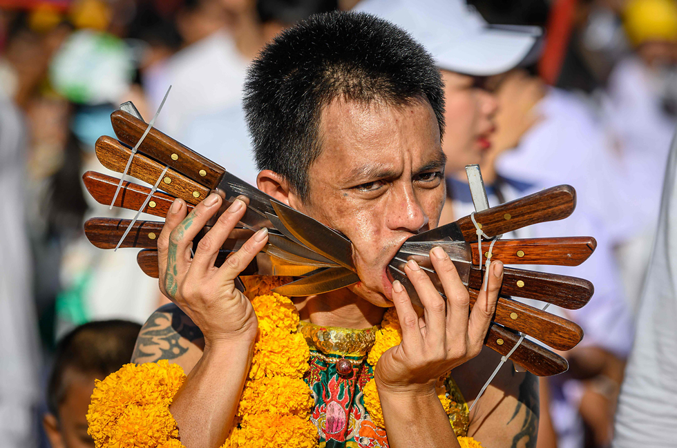תאילנד פוקט פסטיבל ה צמחונים צמחונות (צילום: AFP)