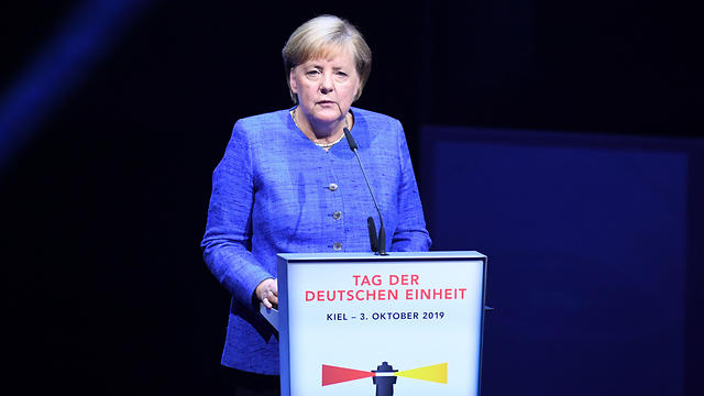 Angela Merkel speaks during the celebrations of the Day of German Unity (Photo: EPA)