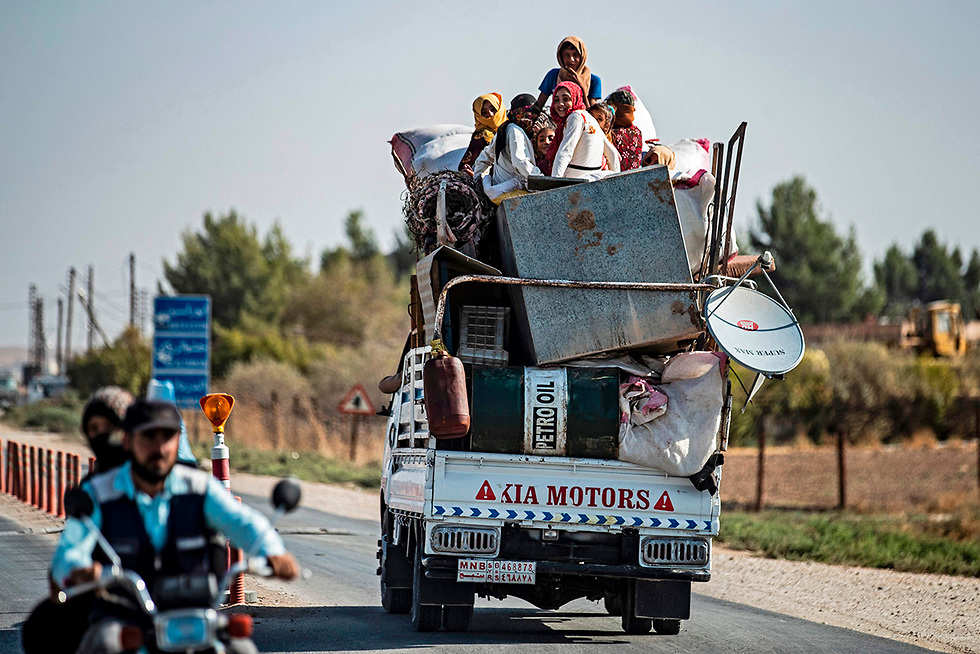 כורדים מגיעים ל Tall Tamr (צילום: AFP)