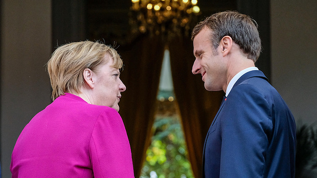 נשיא צרפת עמנואל מקרון ו קנצלרית גרמניה אנגלה מרקל ב טולוז  (צילום: MCT)