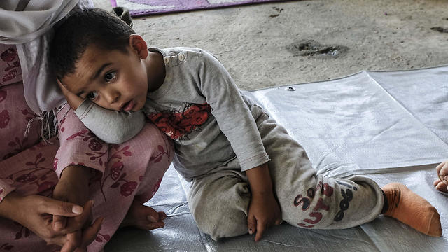A young Syrian Kurdish refugee at a Refugee Welcoming Committee base in Shaila, Iraq, Oct. 20, 2019 