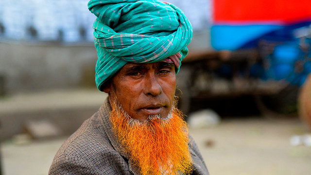 בנגלדש זקנים כתומים זקן כתום (צילום: AFP)