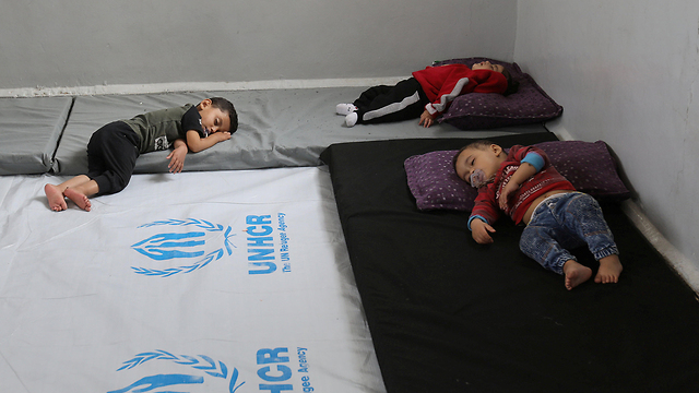 Syrian Kurdish children sleep in bomb shelters amid Turkish offensive (Photo: Reuters)