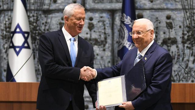 Blue and White leader Benny Gantz receives a mandate to form a governement from President Reuven Rivlin (Photo: Rafi Kotz) 