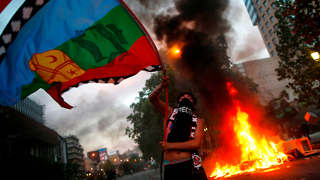 מחאה בסנטיאגו דה צ'ילה (צילום: AFP)