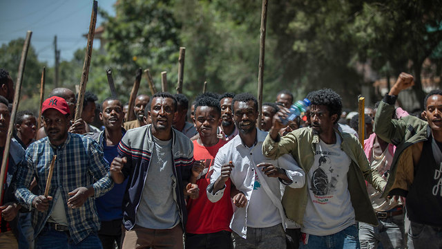אתיופיה תומכי ג'וואר מוחמד מבקר של ראש הממשלה אביי אחמד (צילום: AP)