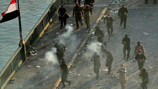 עיראק הפגנות בגדד (צילום: AP)