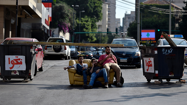 Protesters block a street in Beirut (Photo: EPA)