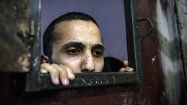 ‘I want to leave the prison and go back home to my family,’ says one prisoner  (Photos: AFP)