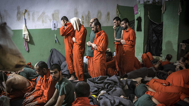 Prisoners praying  (Photos: AFP)