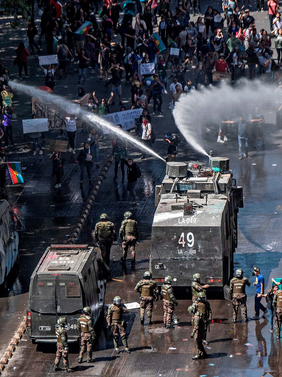 הפגנות מחאה סנטיאגו צ'ילה (צילום: AFP)