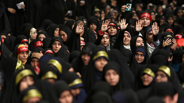 Iranian students listen to Supreme Leader Ali Khamenei (Photo: MCT)