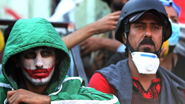 עיראק הפגנות בגדד (צילום: AFP)