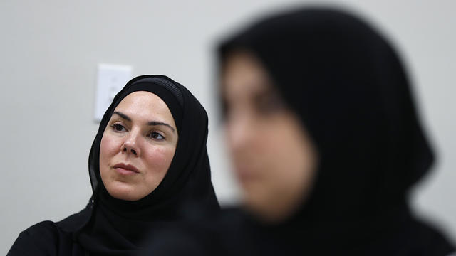 Yasmine Eastman, left, and Amal Faraj listen during a class at the Al-Hujjah Islamic Seminary