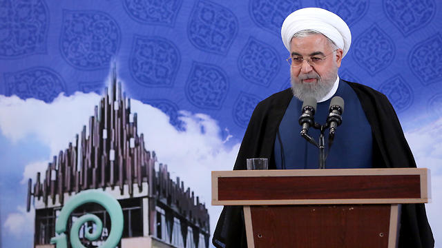 Iranian President Hassan Rouhani announces a new departure from the Iran nuclear deal