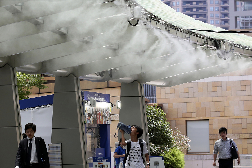 גל חום בטוקיו (צילום: AP)