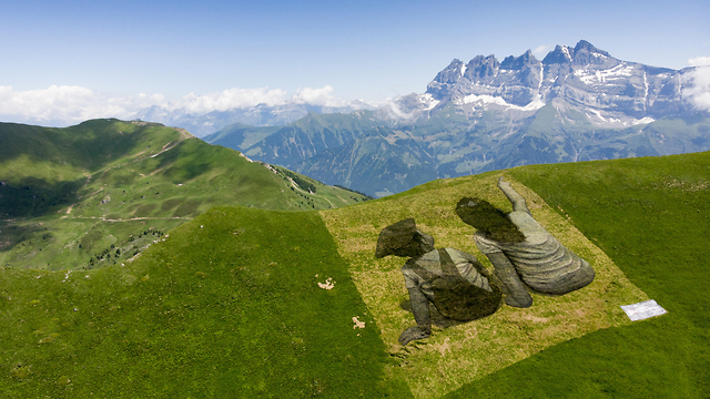 Art in a field on the mountainous border between Switzerland and France, July (Photo: EPA)