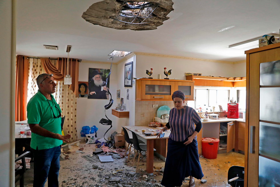 Дом в Нетивоте после прямого попадания ракеты. Фото: AFP