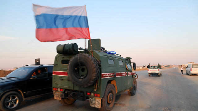 Russian military police forces patrol an area at Qamishli, northern Syria, Oct. 26, 2019 