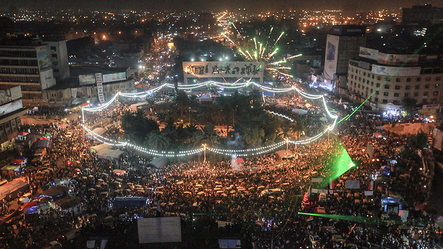 בגדד כיכר תחריר צופים ב משחק מוקדמות מונדיאל עיראק איראן (צילום: MCT)