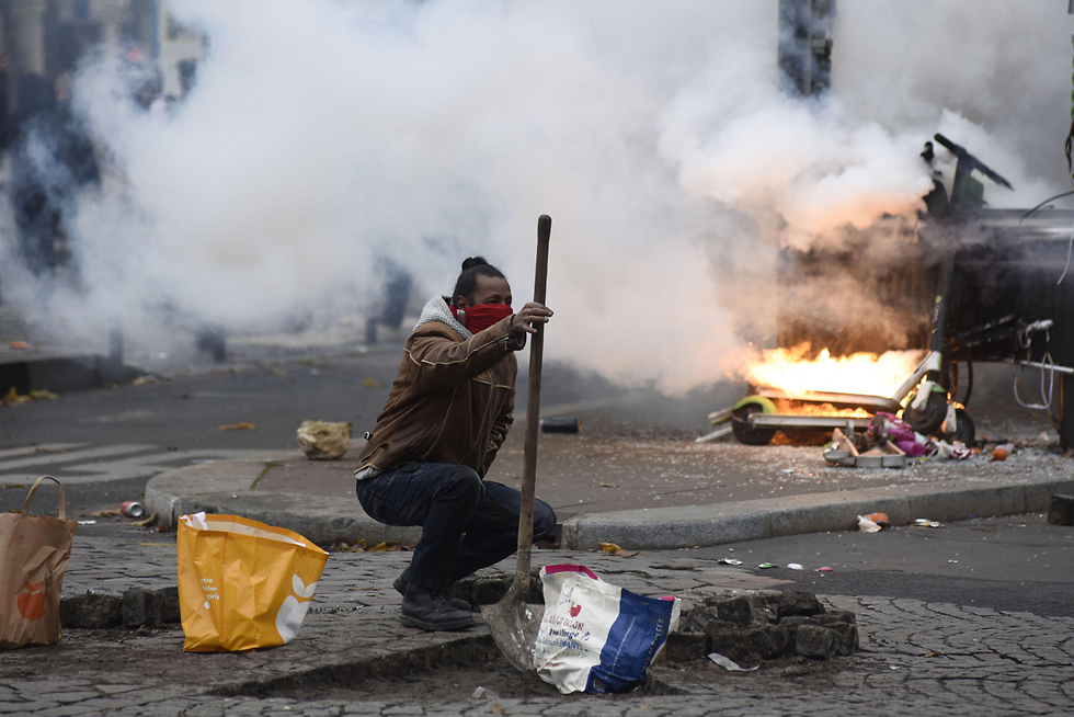 הפגנה מחאת האפודים הצהובים ב פריז שנה של הפגנות צרפת (צילום: MCT)