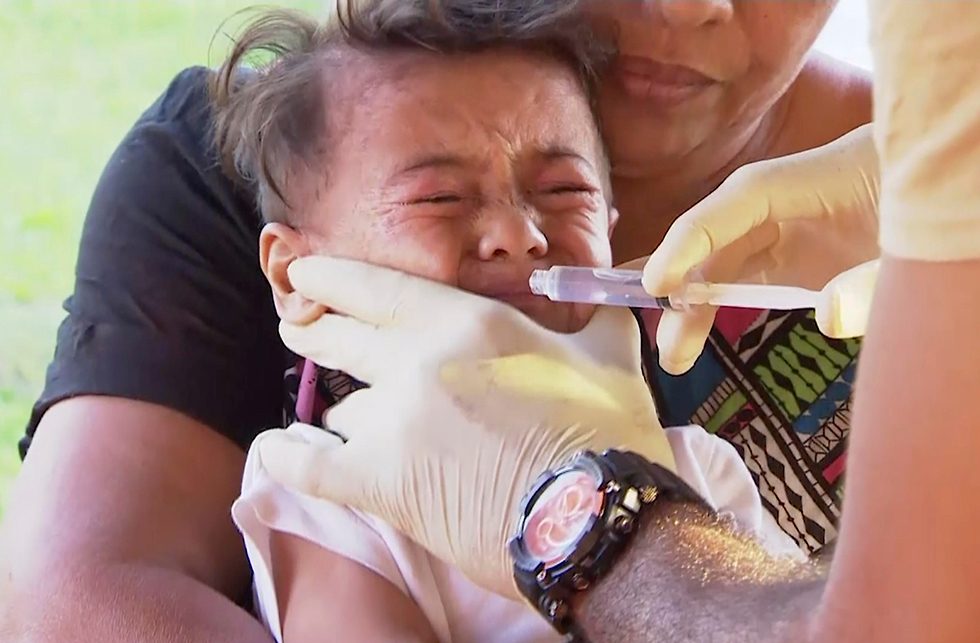 Срочная прививка на Самоа. Фото: AP