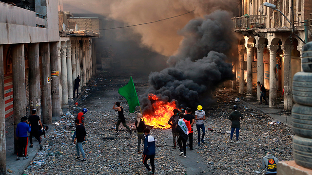 בגדד הפגנות מהומות מחאה עיראק (צילום: AP)