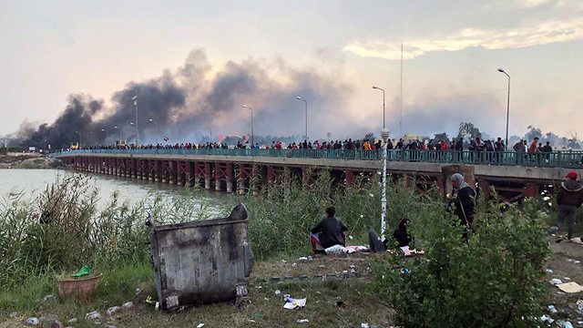 נסירייה הפגנות מהומות מחאה עיראק (צילום: EPA)
