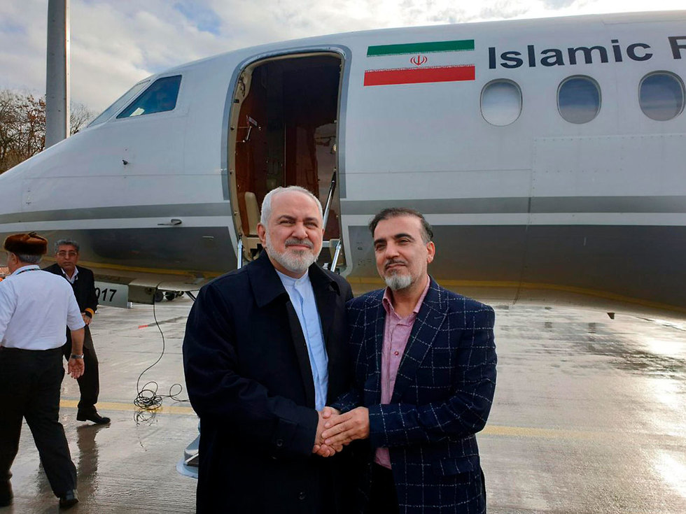שר החוץ של איראן מוחמד ג'וואד זריף עם החוקר מסעוד סולימאני ששוחרר מ ארה