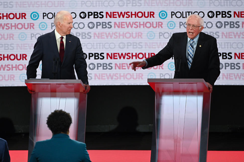 Сандерс и Байден на дебатах. Фото: AFP