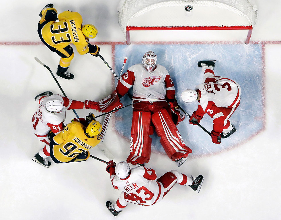 תמונות השנה AP משחק הוקי קרח ארה