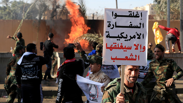  עיראק אנשי ו תומכי מיליציות פרו איראניות דיווח הסתערות שגרירות ארה